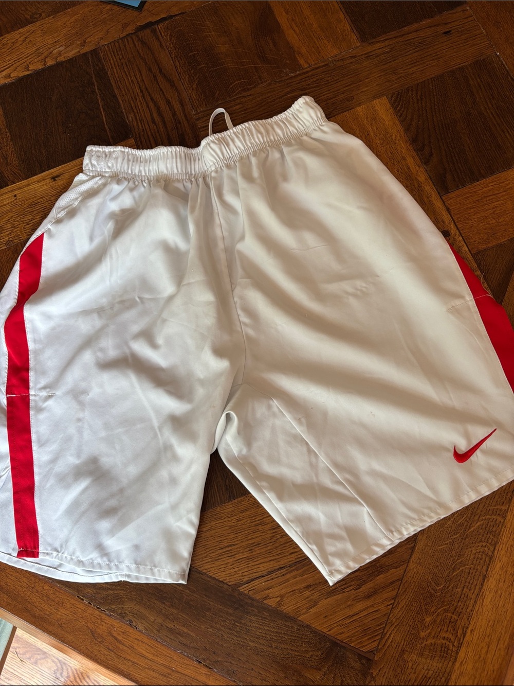 Nike White Men's Athletic Shorts with Red Side Stripes